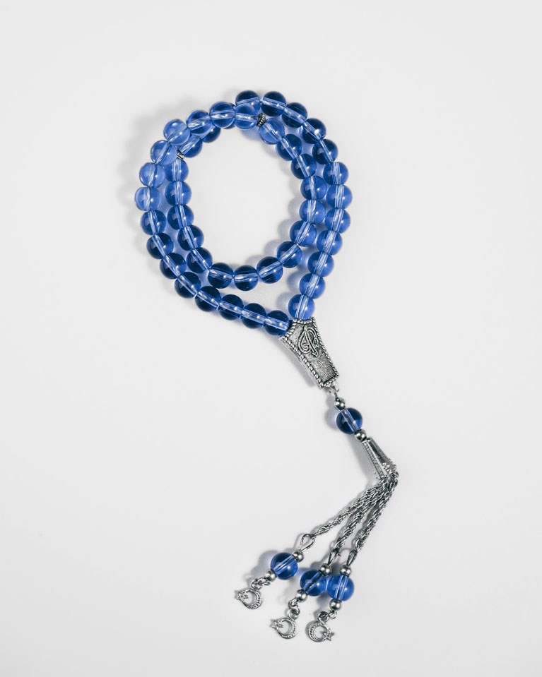 سبحة حجر كريم ازرق شفاف