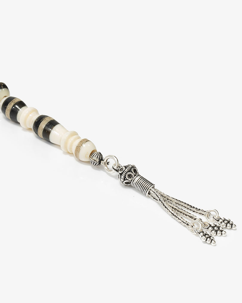 سبحة كوك وعظم منقوش