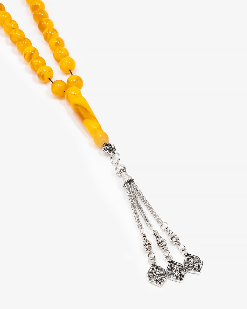 سبحة بكلايت بشكل كهرماني