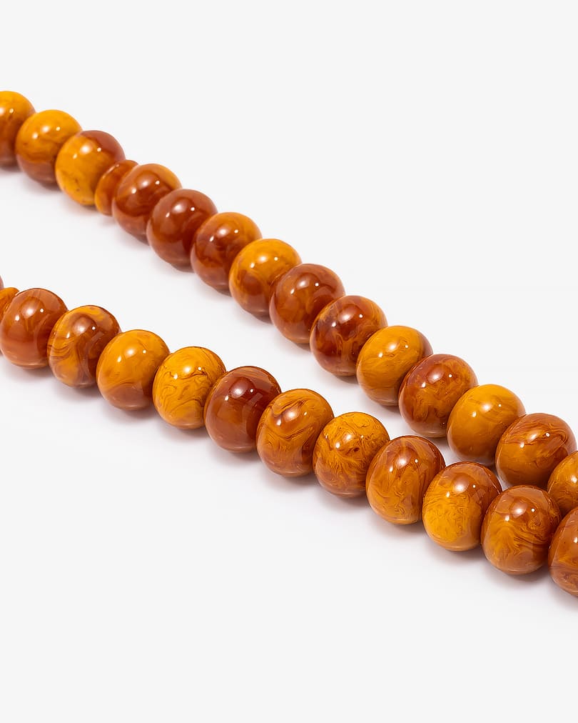 سبحة معطرة معرقة بتراب الكهرمان