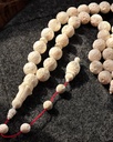 A rare rosary of a hippo's tusk ROS5366WH