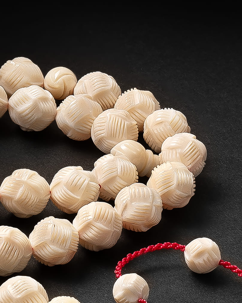 A rare rosary of a hippo's tusk ROS5364WH
