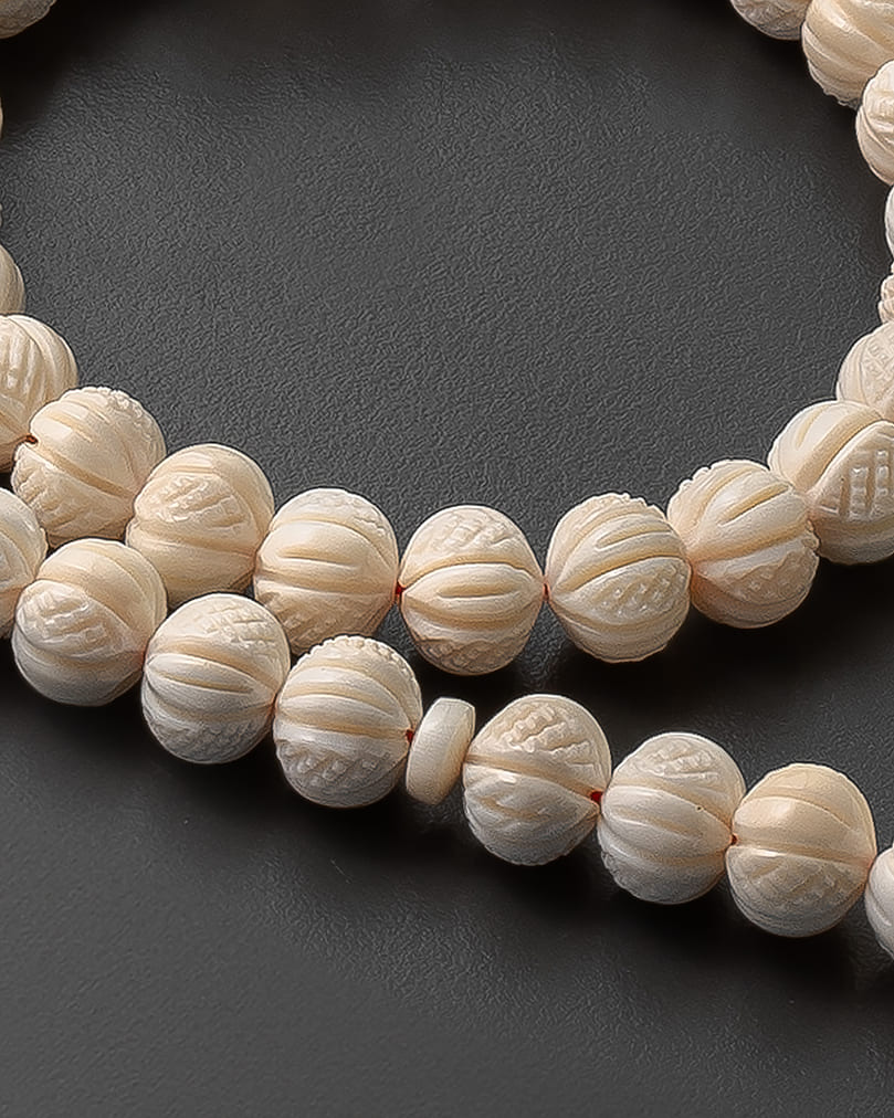 A rare rosary of a hippo's tusk ROS5365WH