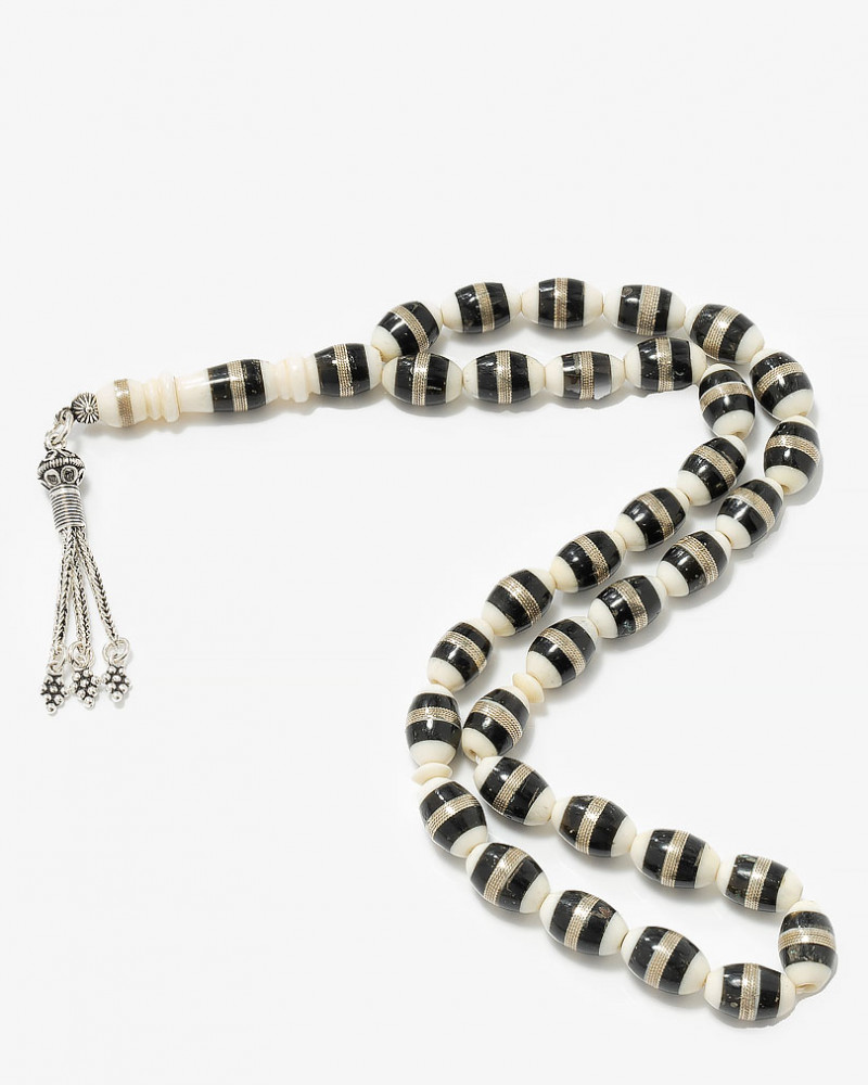 سبحة كوك وعظم منقوش